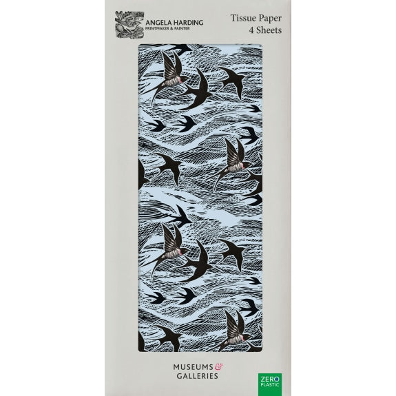 Packaging of tissue paper with bird design and Angela Harding branding.