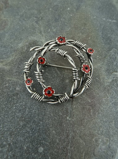 Barbed wire poppy brooch