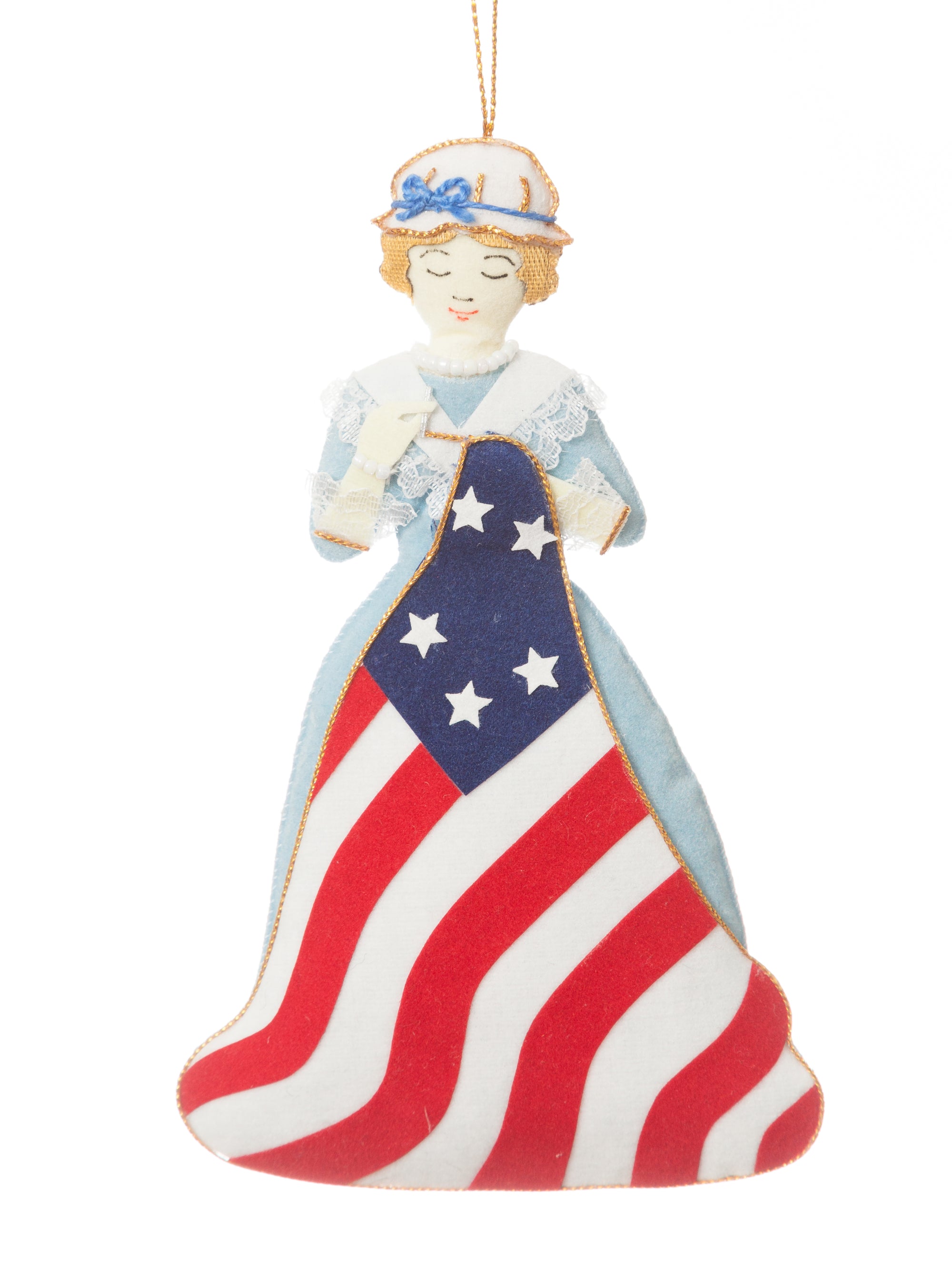 Decorative figure of a woman holding an American flag on a white background