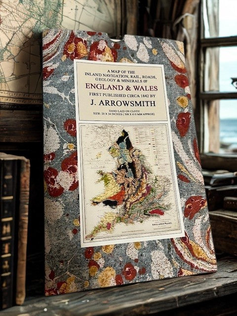 Reproduction Map in slipcase standing upright on a shelf in an old office