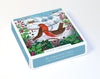Box of Christmas cards with winter scene design featuring birds and holly.