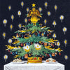 Decorated Christmas tree with angel, ornaments, and candles against a dark background