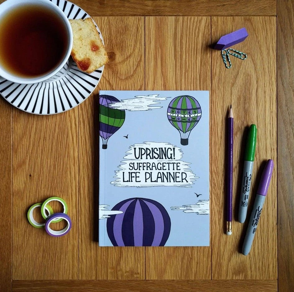 Uprising! Suffragette Life Planner Notebook on a table